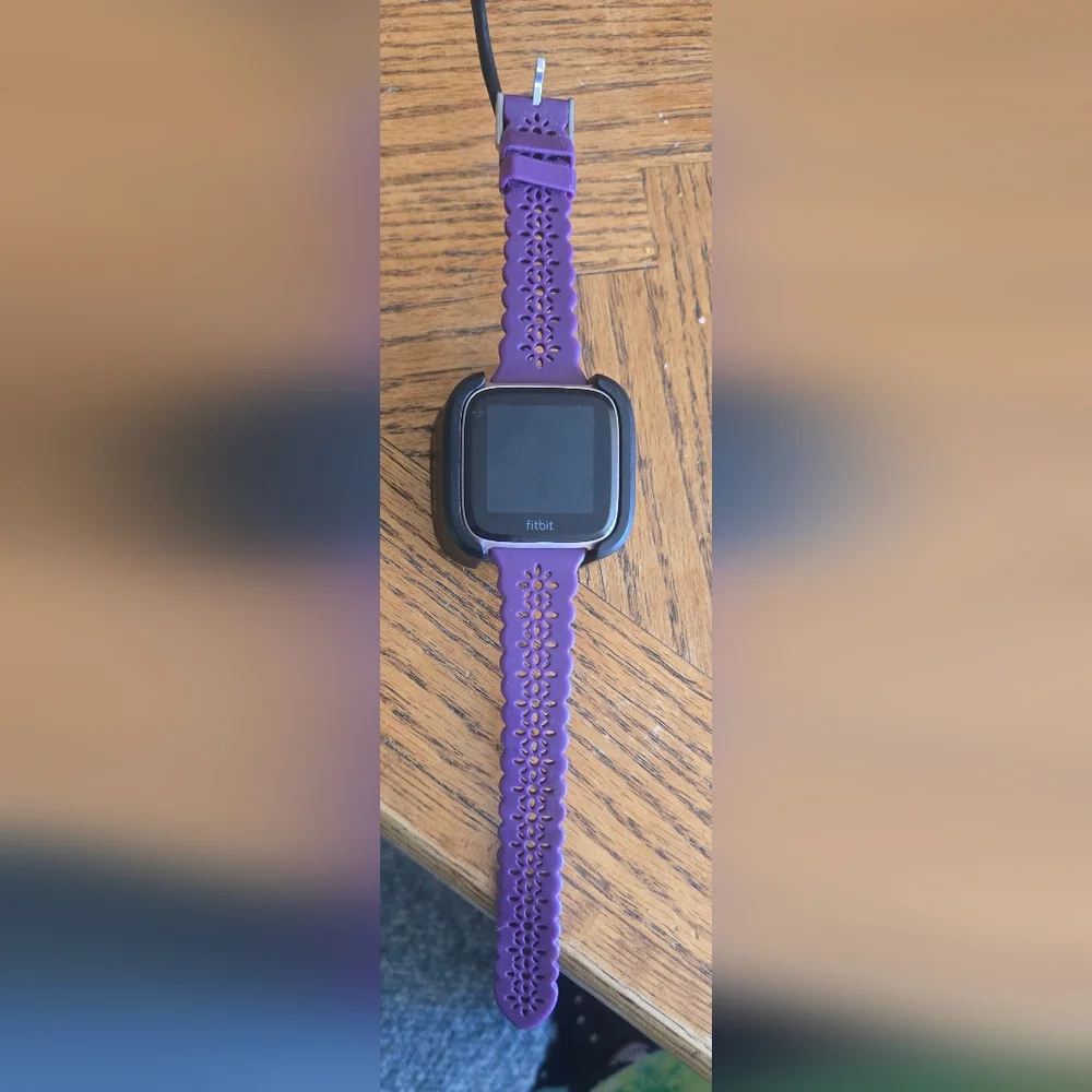Fitbit Smartwatch with Purple Strap
